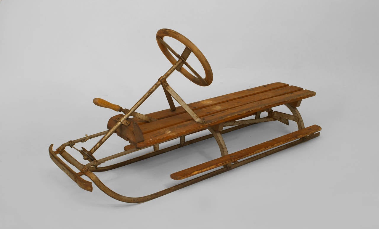 antique sled with steering wheel