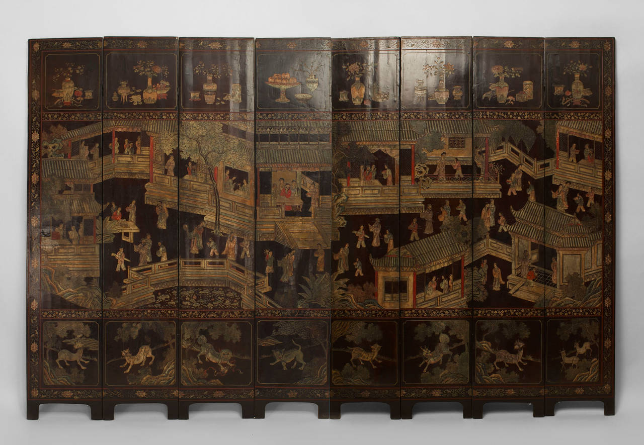 Asian Chinese (18th Century) 8 panel black coromandel screen with a scene depicting figures with pavilions and having a border with animals & objects with a reverse side having a floral & bird design.
