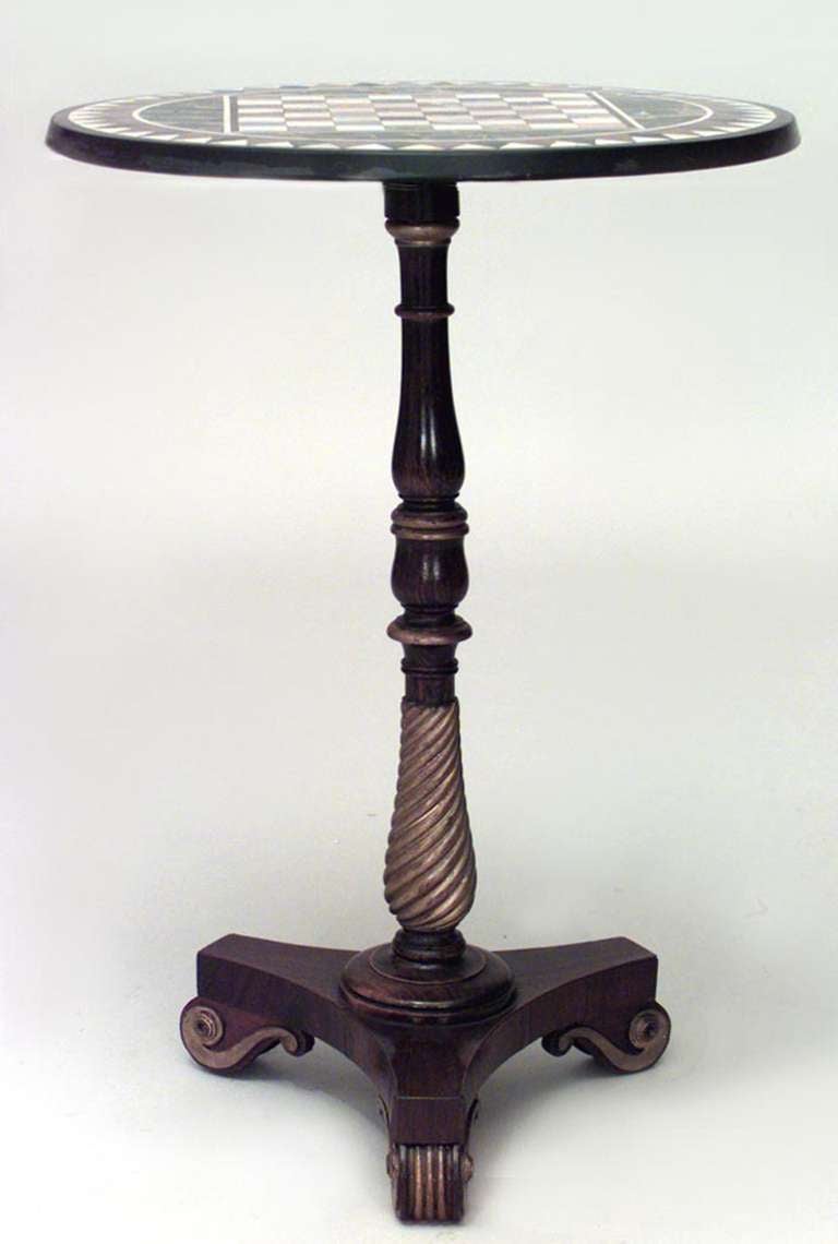 English Regency style (19th Century) rosewood and gilt trimmed pedestal base game table with round marble inlaid chess / checkerboard top.
