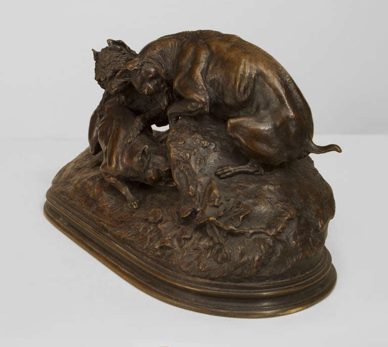 Signed by nineteenth century French sculptor P.J. Mene, this patinated bronze sculptural group is titled 