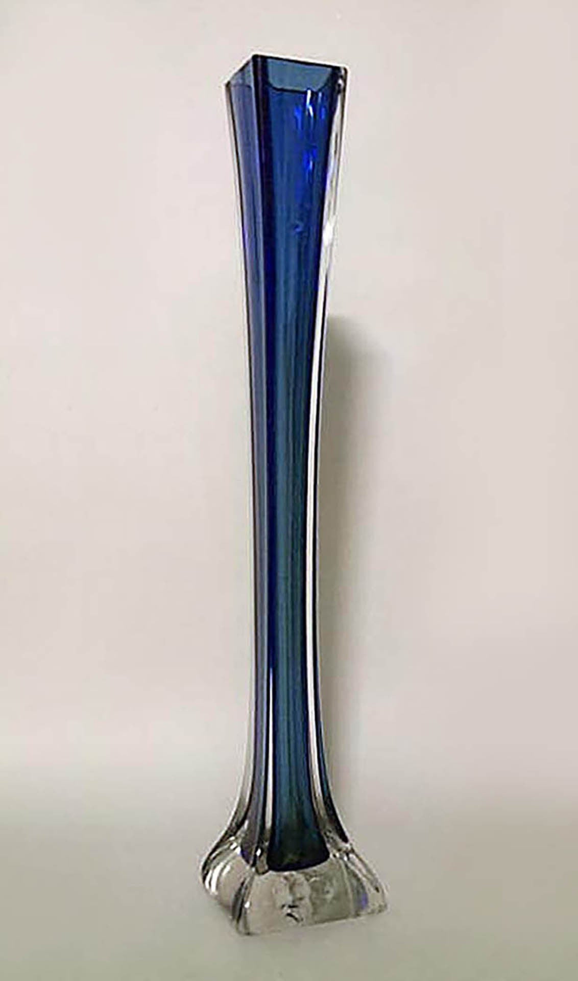 Pair of American Art Deco tall blue glass bud vases with square shaped bases.