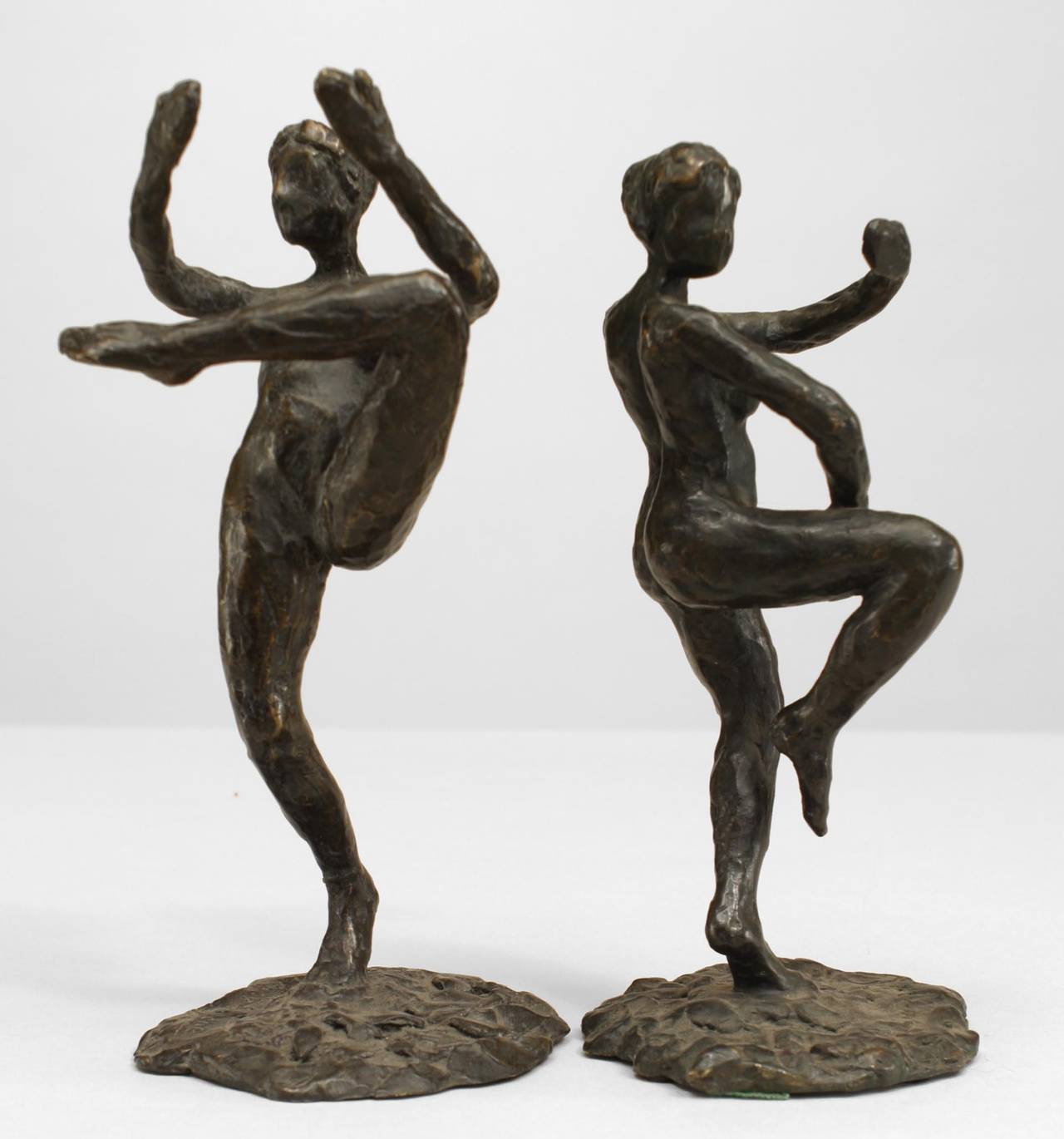 Pair of French Post-War Design 1980/90s bronze stylized female figures (signed LaROCHE)
