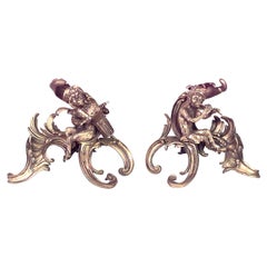 Paire de chenets Louis XV en bronze en forme de singe
