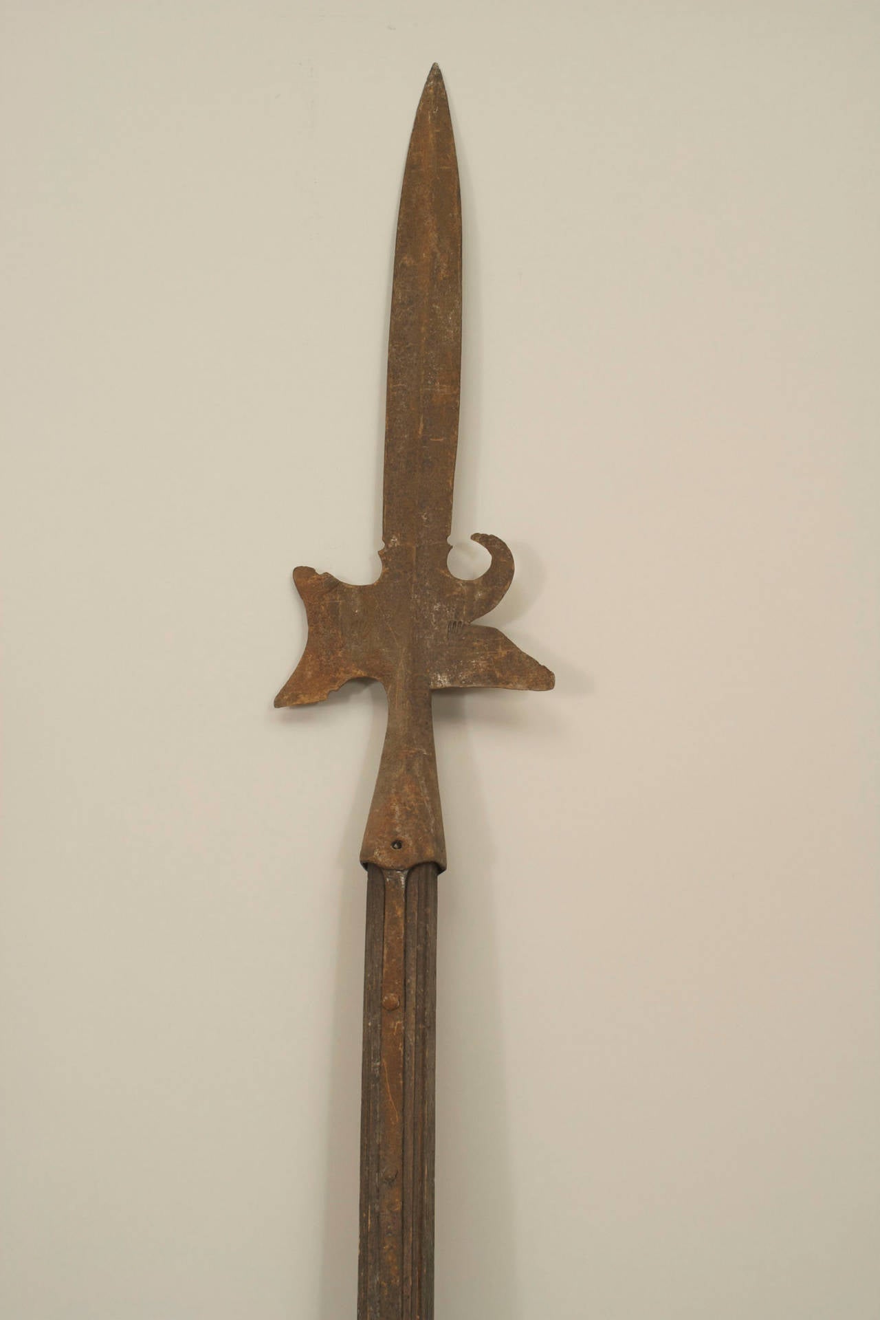 English Renaissance-style spear with crossed leather covered shaft and polished steel blade.
