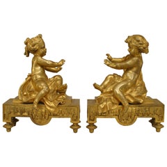 Antique Pair of French Gilt Bronze Cupid Andirons