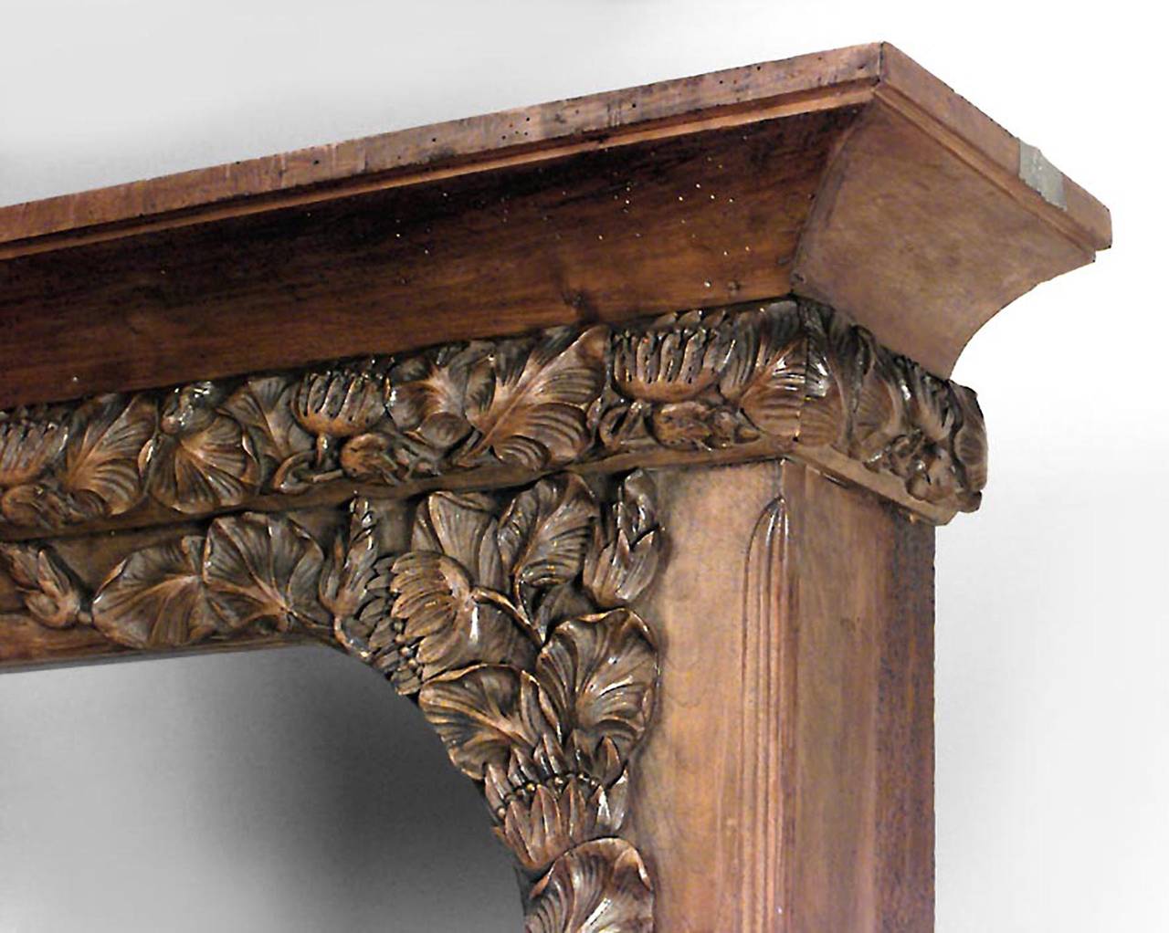 French Art Nouveau walnut narrow 3 section bookcase/archway with 6 shelves and carved floral trim.
