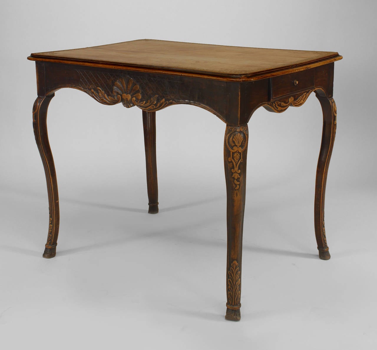 Eighteenth century French Provincial rectangular end table with two side drawers, a floral carved apron, cabriole legs, and a tooled beige leather top.