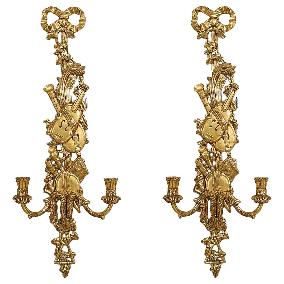 Pair of French Louis XV Style Gilt Instrument Wall Sconces For Sale