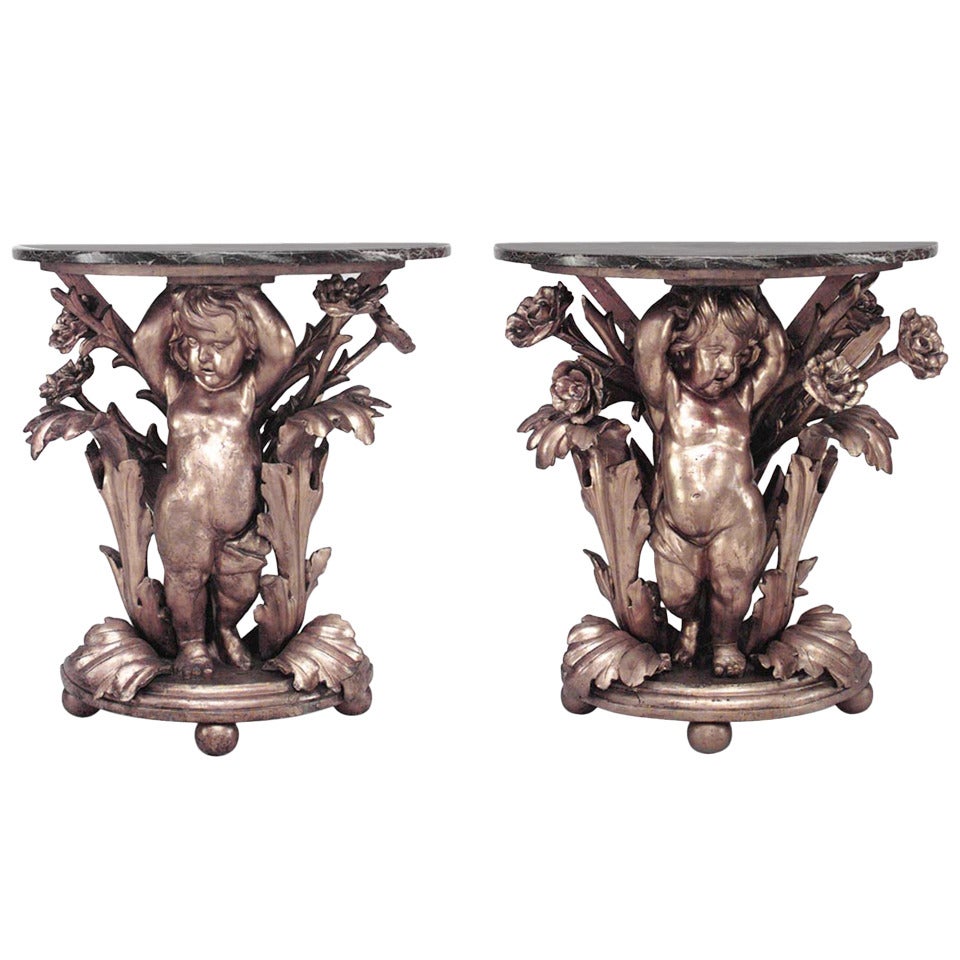Pair of French Louis XV Gilt Cupid Marble Top Console Tables For Sale