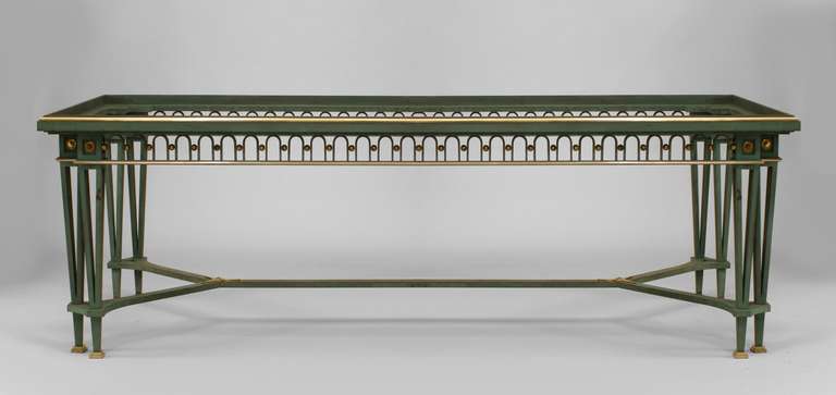 French mid-century (1940s) green patinated iron and bronze trimmed dining table with green marble top above a filigree apron and stretcher base (Attributed to Gilbert Poillerat & Jacques Quinet).
  