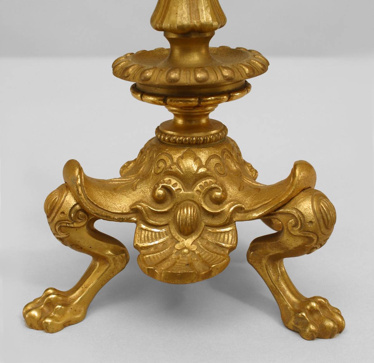 Pair of English Regency-style (19th Century) gilt bronze candlesticks with 3 claw feet and urn top (PRICED PER Pair)
