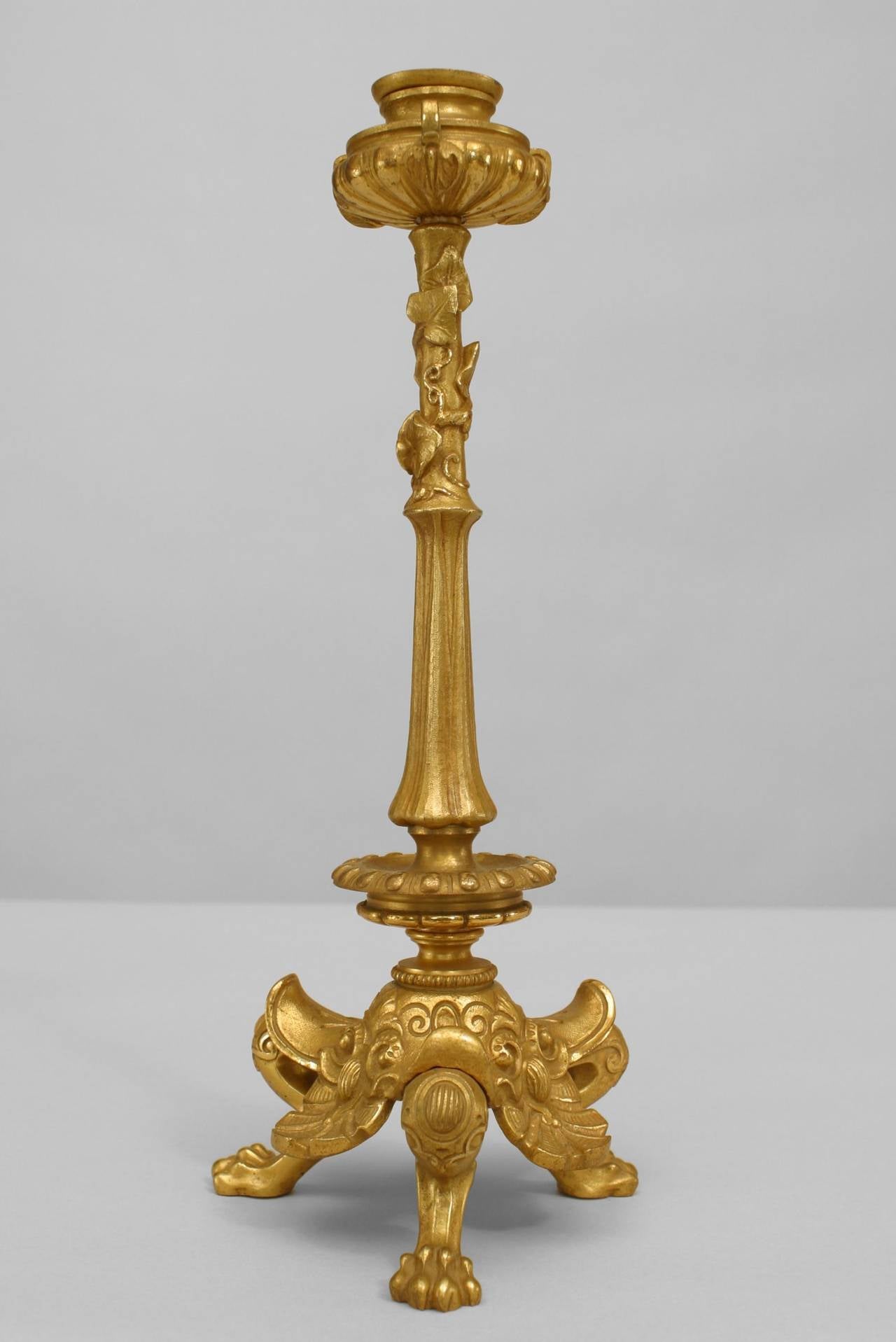 Pareja de candeleros ingleses de bronce dorado de la Regencia siglo XIX en venta
