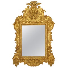 Italian Rococo Carved Giltwood Cupid and Floral Design Wall Mirror
