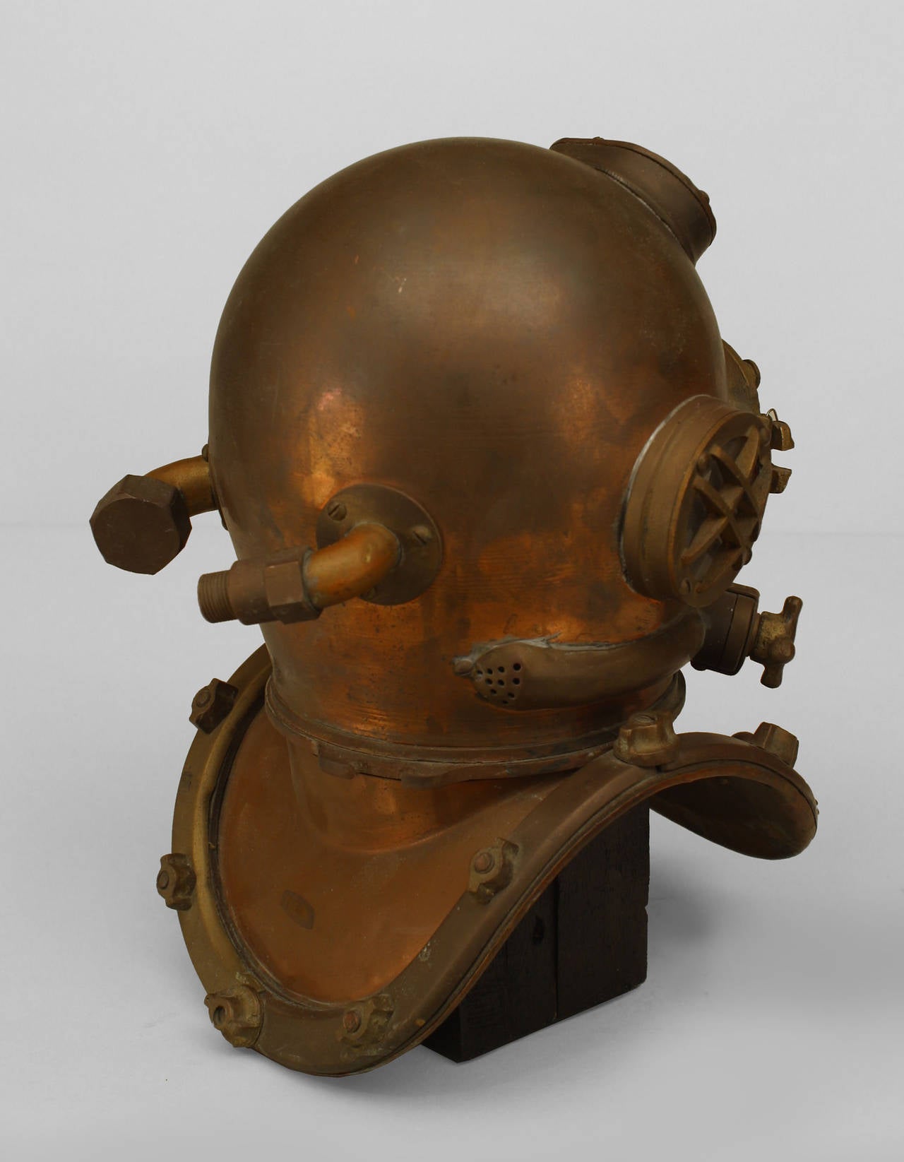 Early 20th American copper and brass model of a diver's helmet mounted on a wood base. 1/2 Scale model