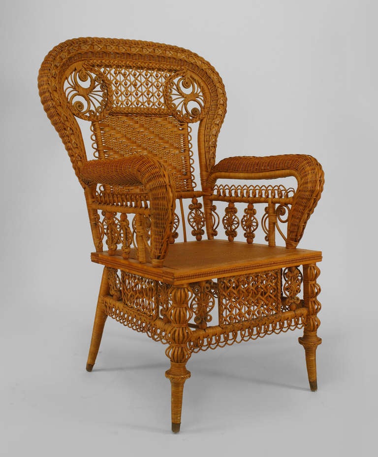American Victorian ornate natural wicker arm chair with woven panel back, and filigree trim (HEYWOOD BROS. label)