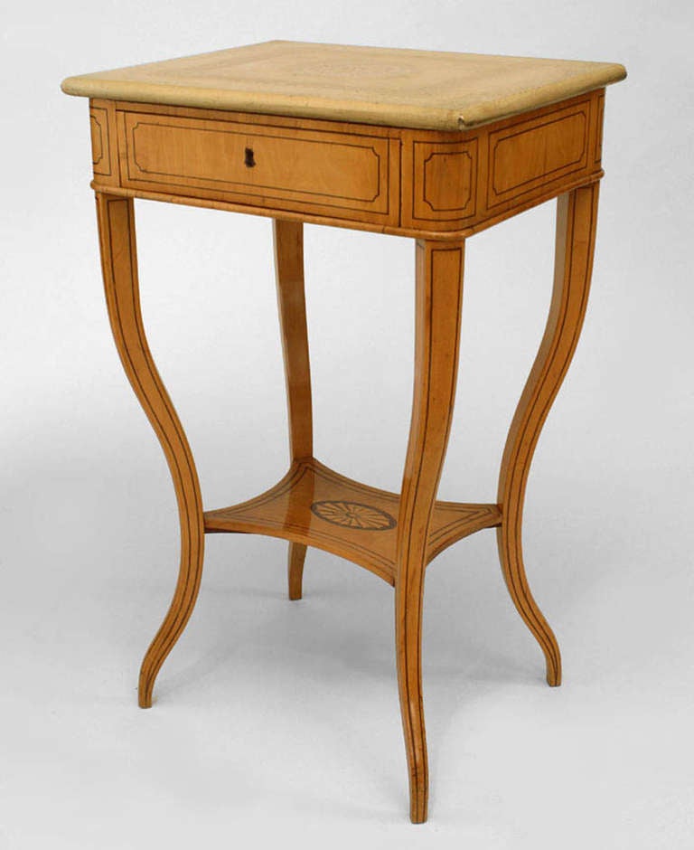 French Charles X maple and inlaid end table with decorated white marble top.
