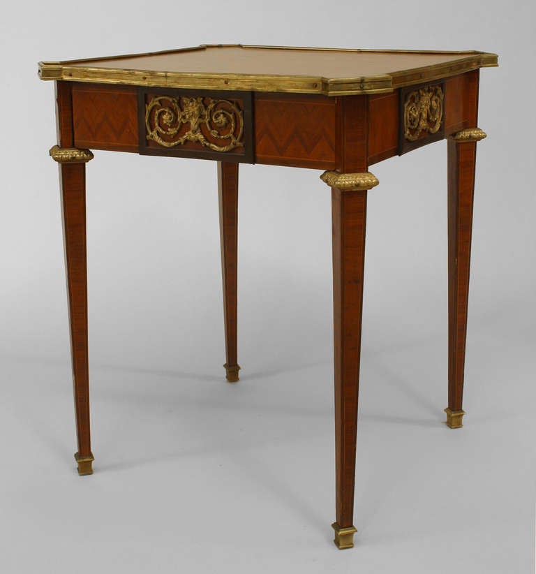 French Louis XVI-style (19th Century) square end table with a geometric parquetry inlaid top and gilt bronze trim on apron, top edge and legs with a single drawer.
