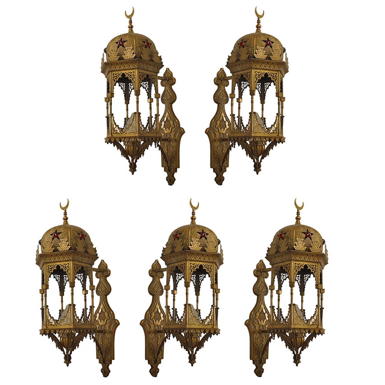 Middle Eastern Moorish-style (1st quarter 20th Century) six-sided bracket lantern wall sconce with embossed brass and fretwork design and glass jewels inset in the top. Only one sconce left.
 
