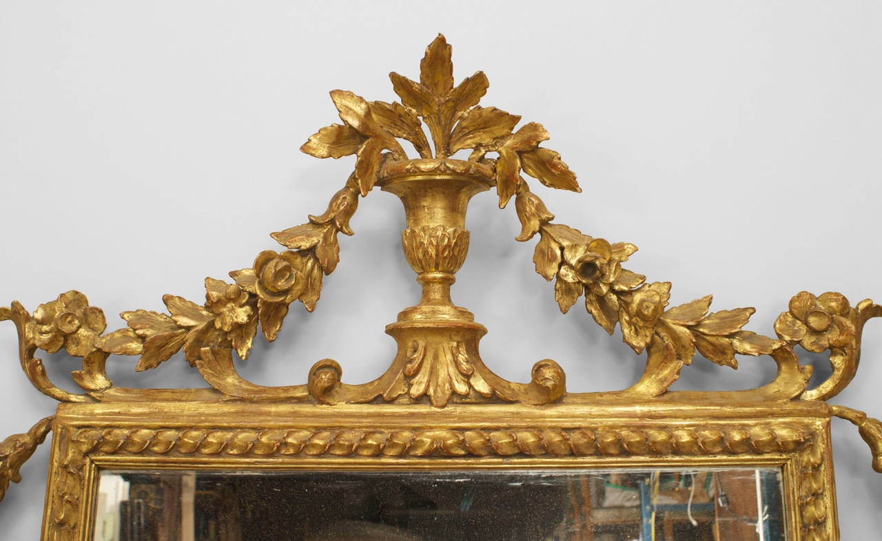 18th century Italian Neoclassic (likely Florentine) gilt wood horizontal three section mirror with a festoon design top pediment. Mirror replaced.