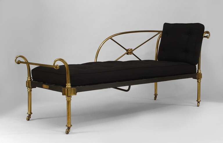 19th Century English recamier with a brass frame featuring Neoclassical x-form and scroll details beneath a black seat and back cushion. The piece bears a brassmaker's plaque with the Royal Coat of Arms of the United Kingdom and the inscription