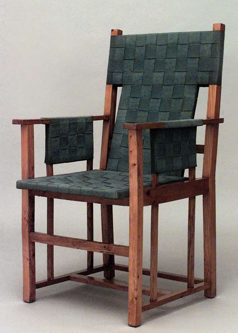 Set of 4 of English Arts & Crafts blond wood arm chairs with woven green strap seat and back. (PRICED AS SET)
