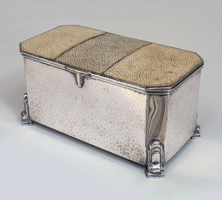 English Art Deco silver plate box featuring tiered design feet and a tri-tone beige shagreen lid.