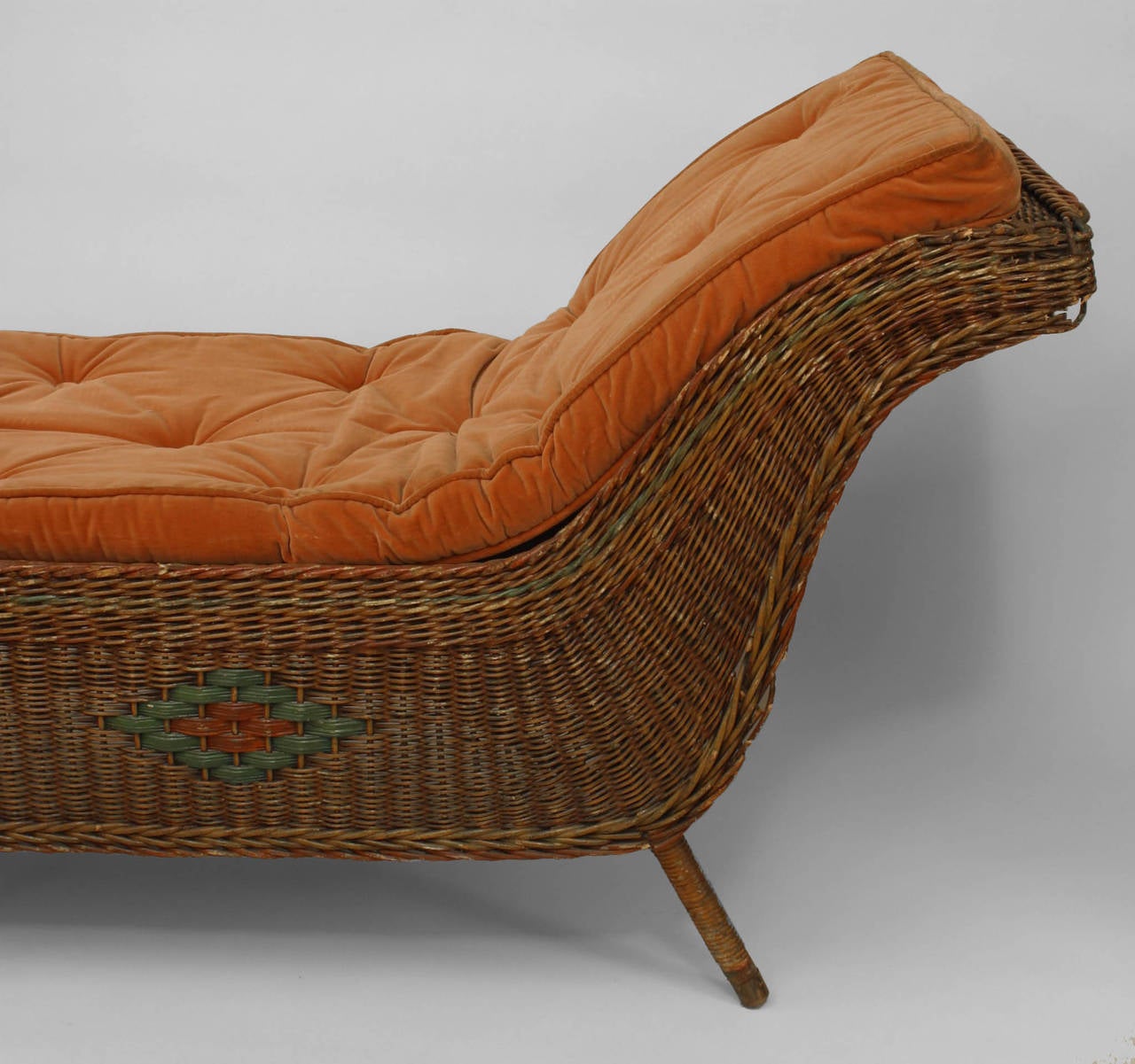 American Art Deco natural wicker backless recamier with red and green
painted trim (as is).