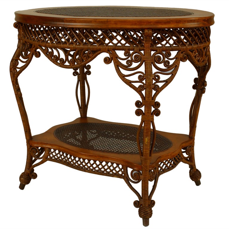 HeywoodWakefield Filigree Wicker Oval Center Table For Sale at 1stdibs