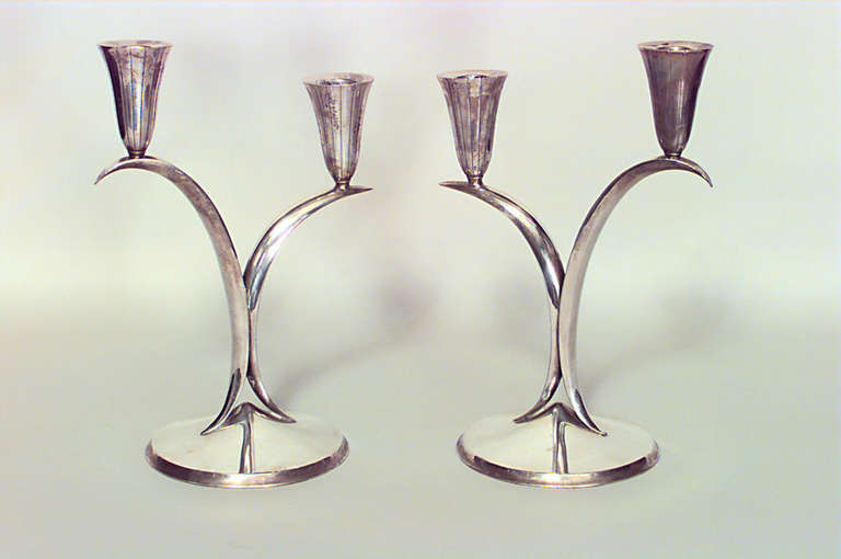 Pair of Italian Mid-Century (1940s) silver plate 2 arm candelabras supported on a round base (Attributed to GIO PONTI) (PRICED AS Pair)
