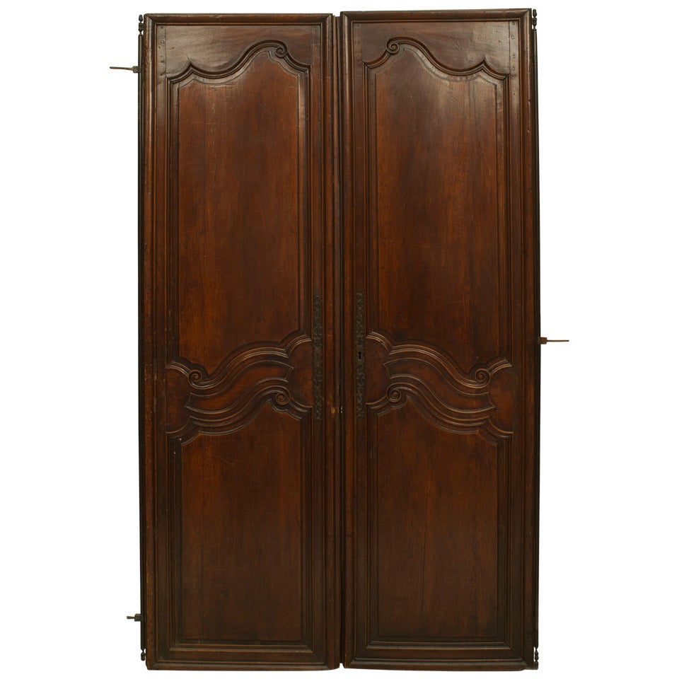Pair of French Provincial Carved Walnut Doors For Sale