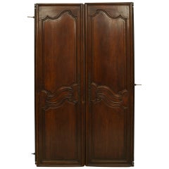 Pair of French Provincial Carved Walnut Doors