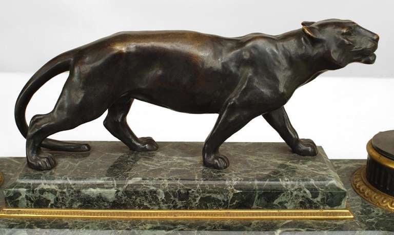 French Victorian green marble double inkwell with bronze trim and centered figure of tiger.
