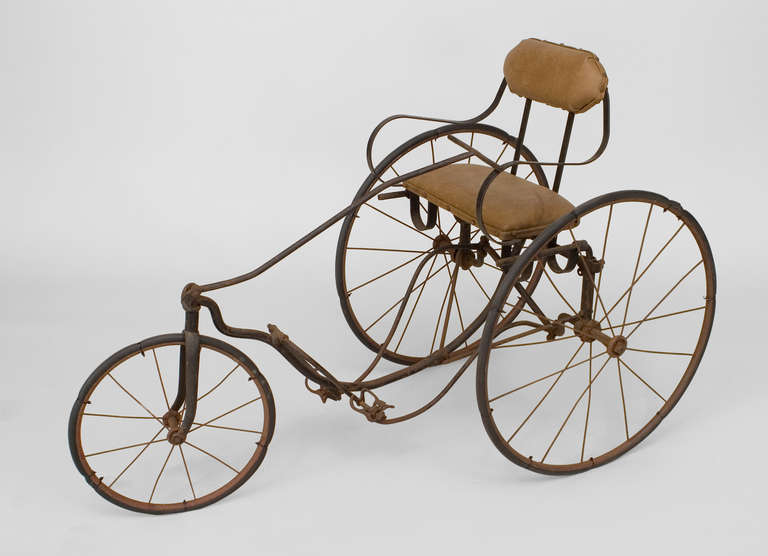 American Victorian iron tricycle with a carriage seat (tag: GENDRON WHEEL CO., TOLEDO, OH)
