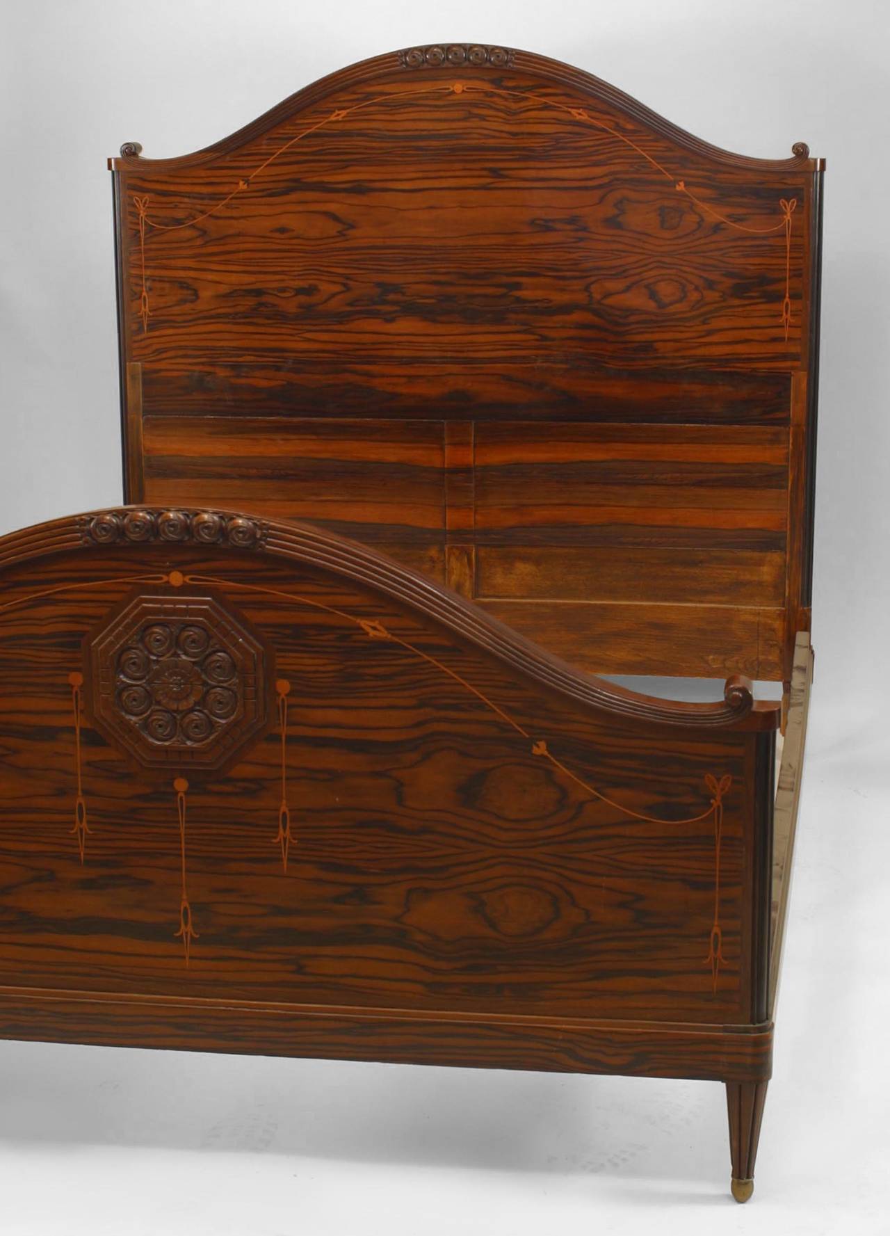French Art Deco palisander, amaranth and marquetry queen-size bed with arched head and foot boards (includes two rails).