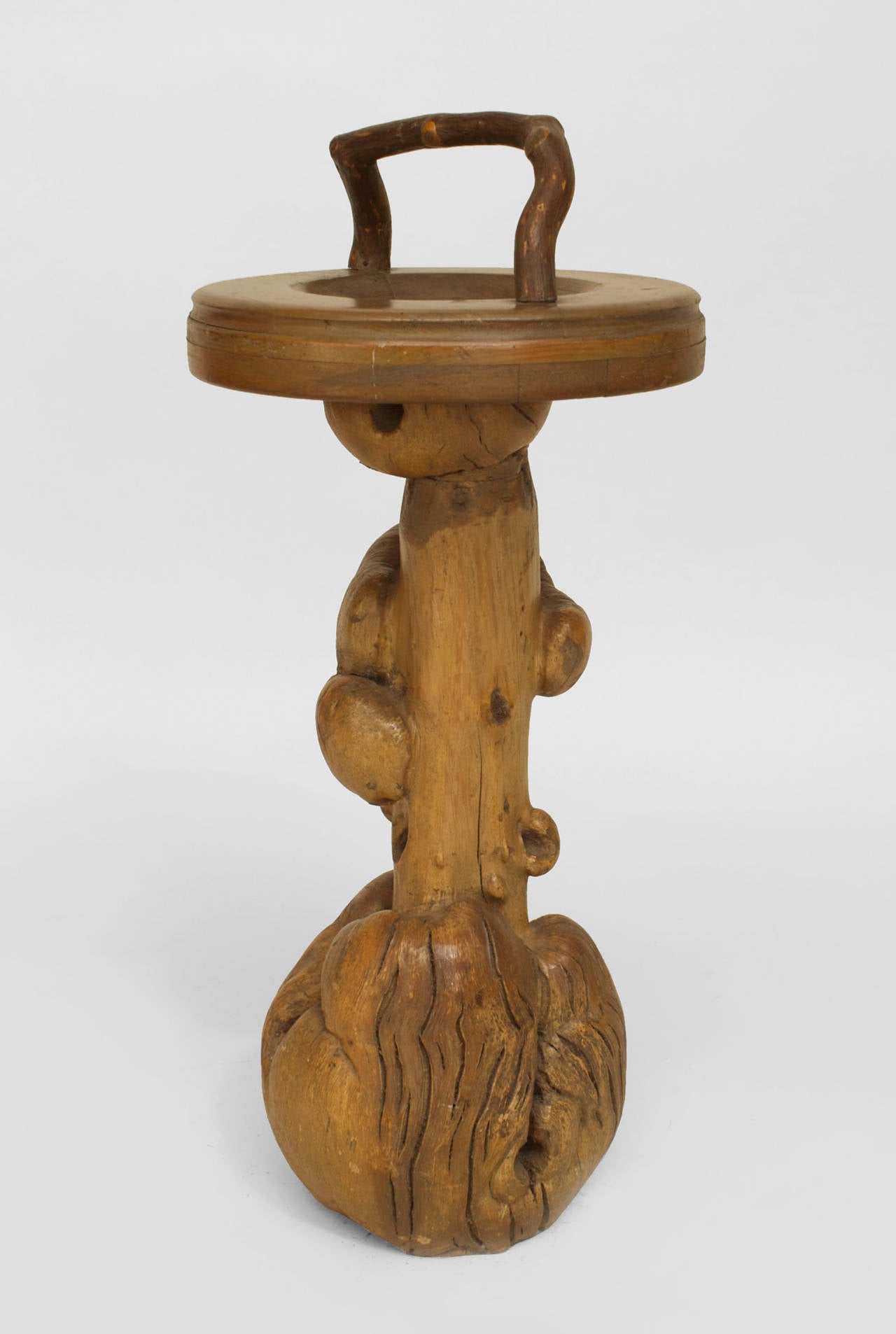 American Rustic (1930s) stand with a root form pedestal base supporting a round (ashtray) top with a handle (att: MOLESWORTH)
