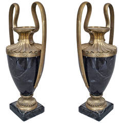 Pair of 19th Century French Brass Trimmed Black Marble Urns