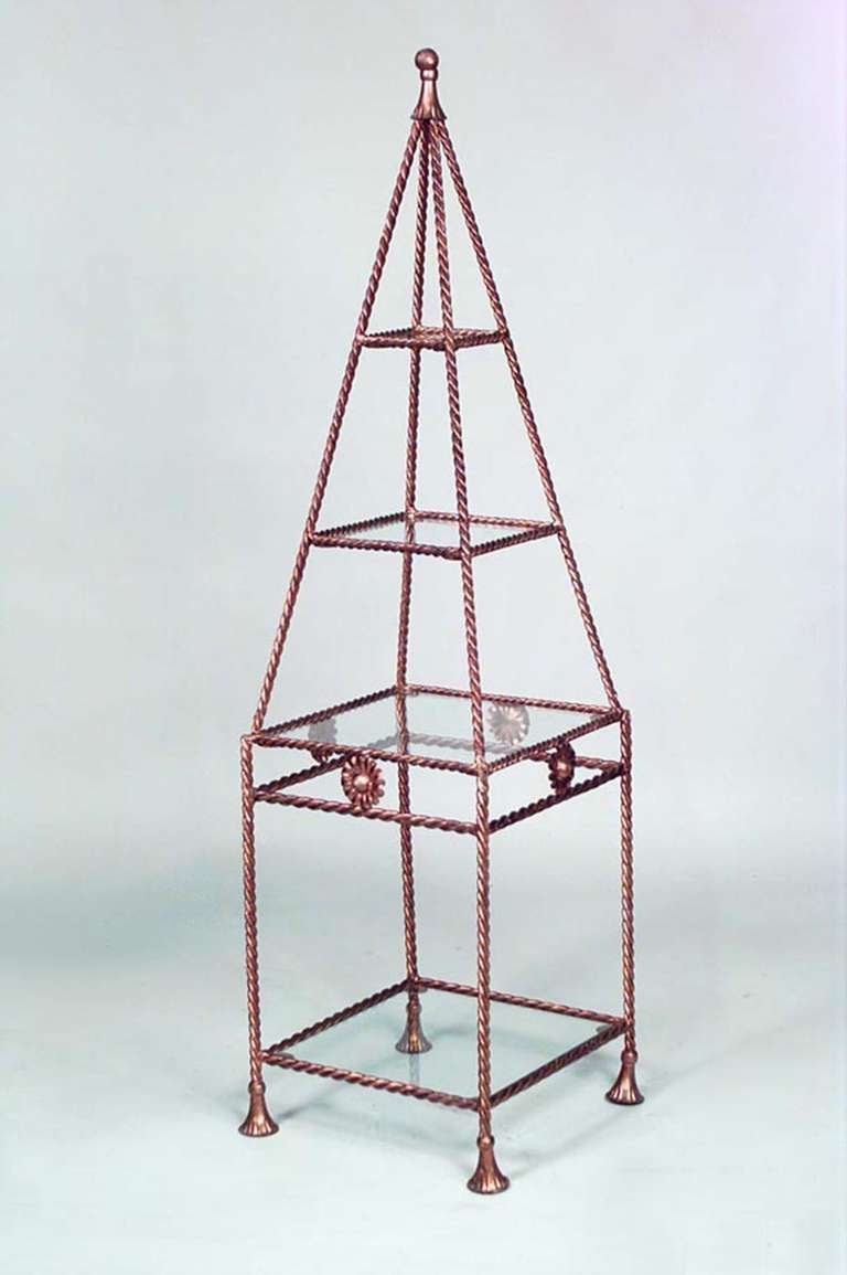 Rope and tassel design (20th Century) gilt metal obelisk shaped 4 shelf etagere
