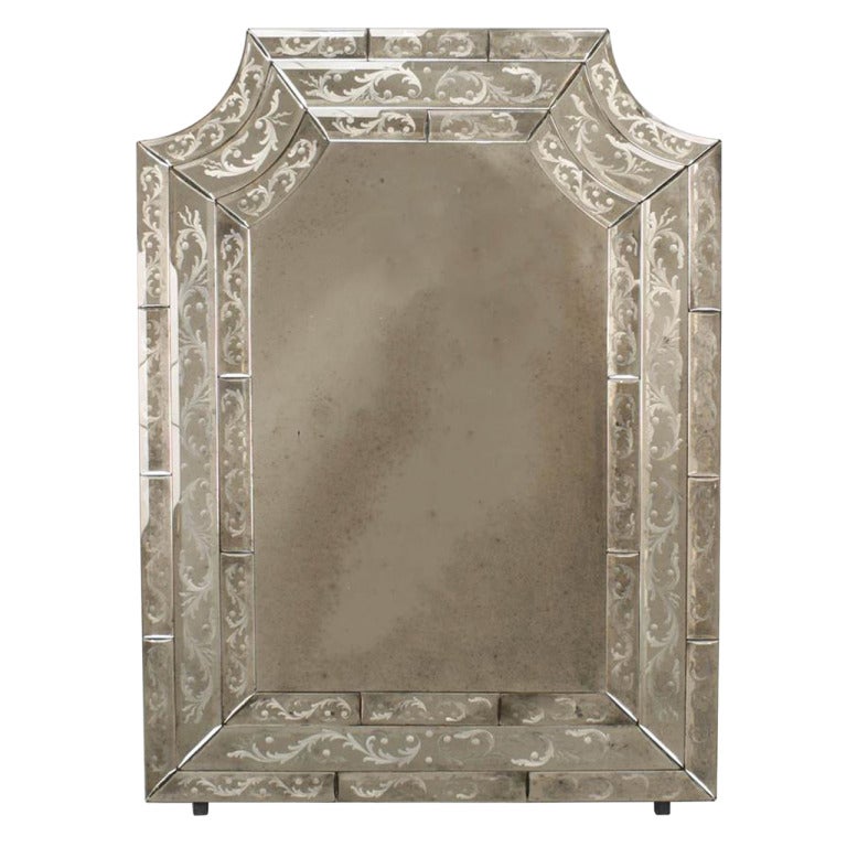 1 Italian Venetian (21st Century) Murano wall mirror with cut out top corners on a three-tier designed frame with etched scroll and floral motifs. (PRICED EACH)
