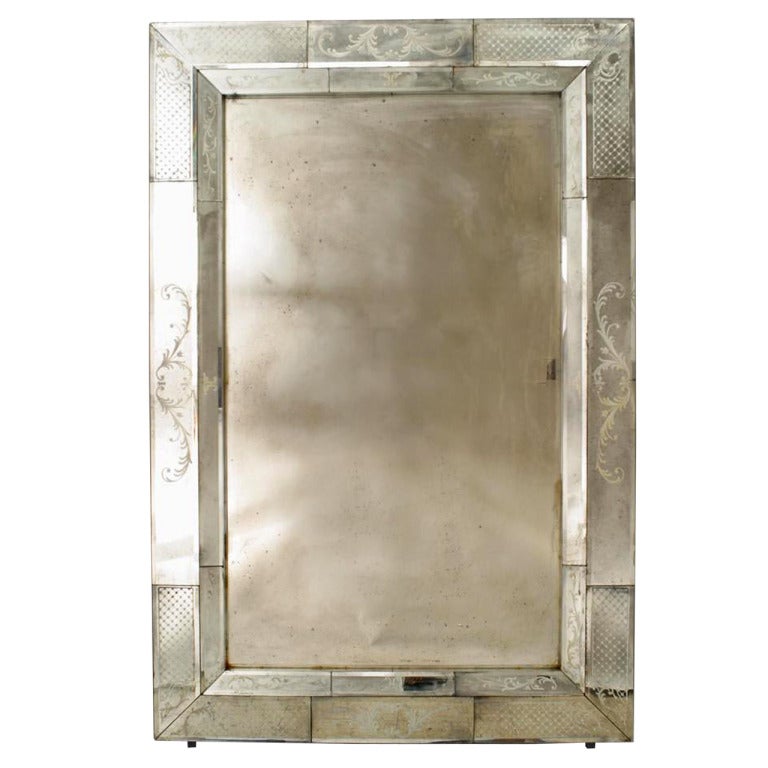 Italian Venetian Murano (modern) rectangular wall mirror with etched scroll design glass frame with a narrow mirrored inside border. (SEGUSO).
 