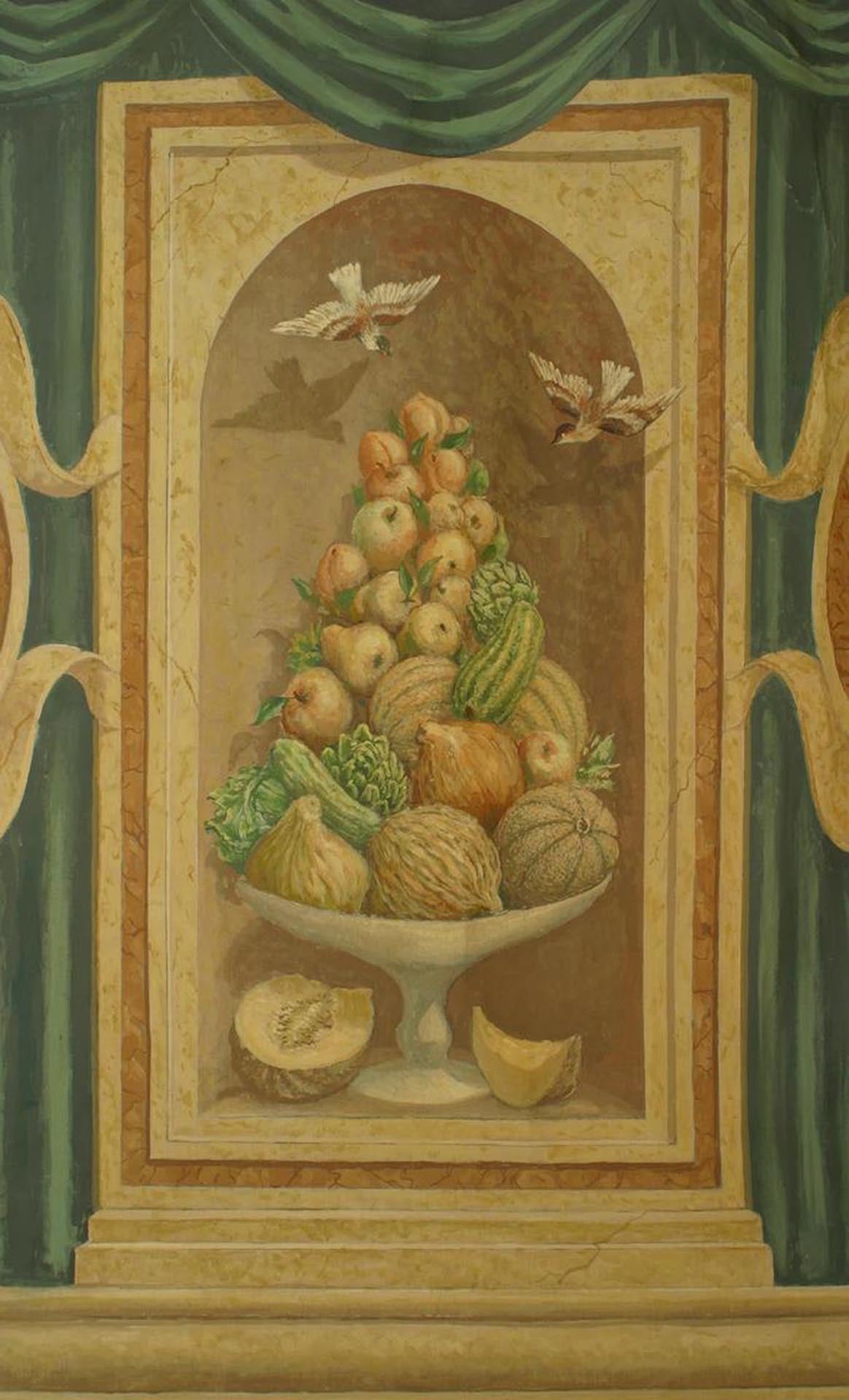 Italian Neo-classic style mural painting on canvas of a Pair of medallions with cupids centering a still life of fruit behind a blue drape with a swag valance
