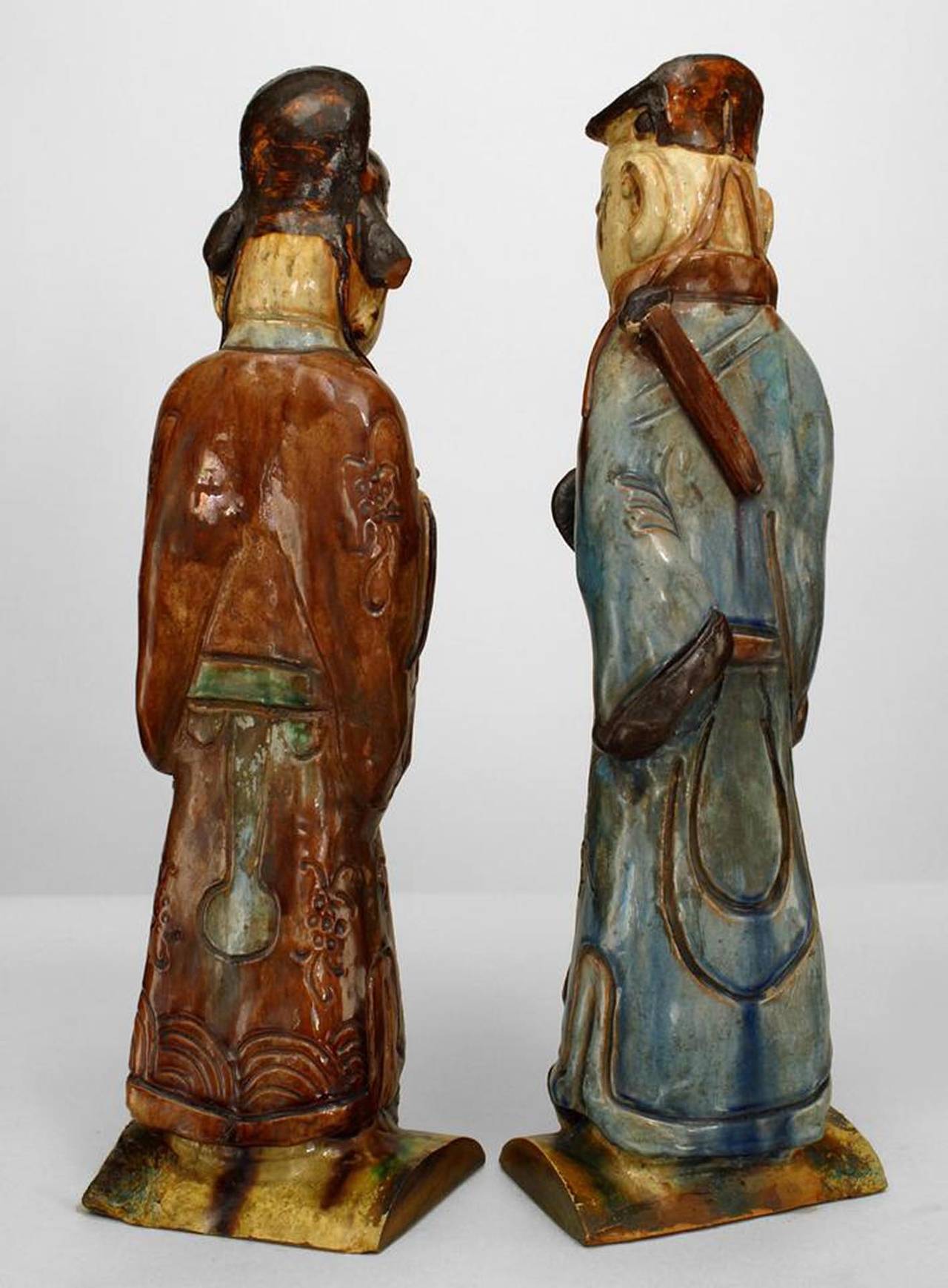 Pair of Asian Chinese style (19th Cent) porcelain male figures wearing robes
