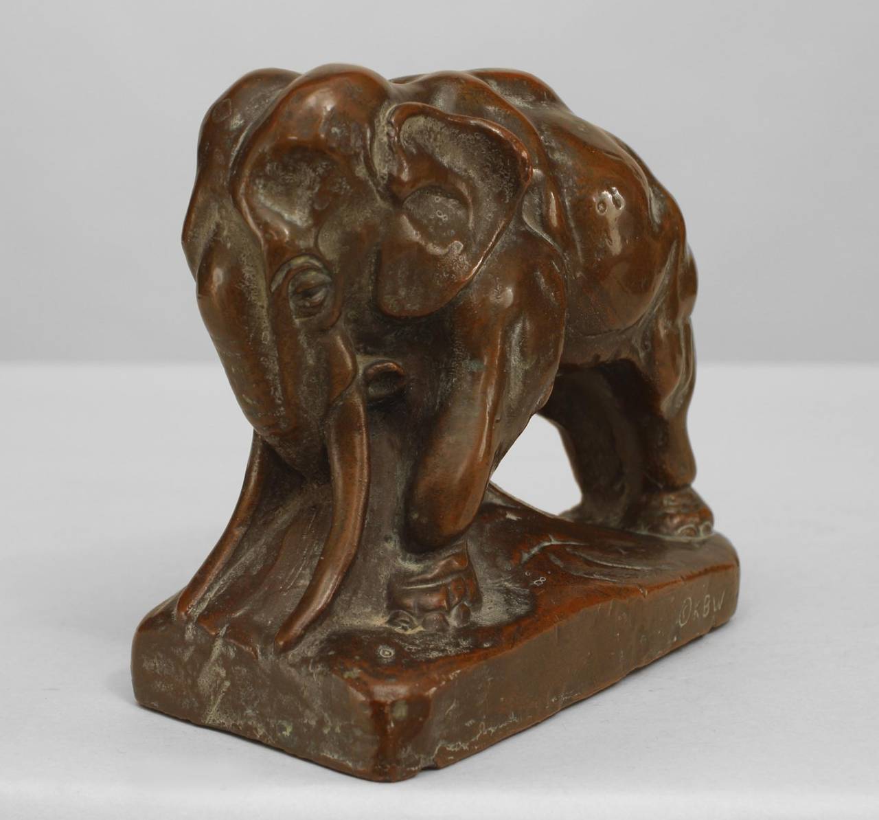 Pair of Continental (possibly Austrian - 20th Century) bronze-patinated copper bookends in the form of elephants. (PRICED AS Pair)
