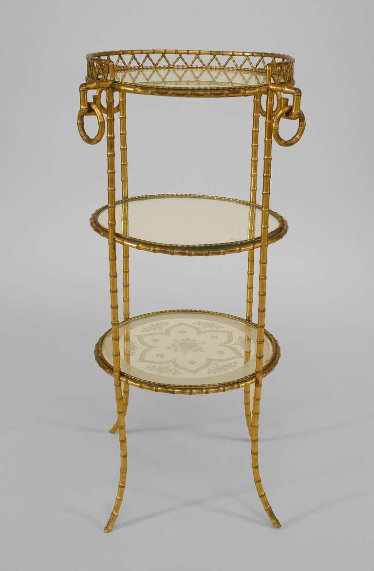 Napoleon III bronze dore faux bamboo three tiered muffin stand with etched glass shelves and a filigree gallery. The stand is signed 