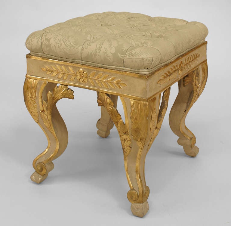 Italian Neoclassic style (circa 1925) parcel gilt & cream painted stool with close buttoned upholstered square seat on cabriole legs with acanthus brackets.
