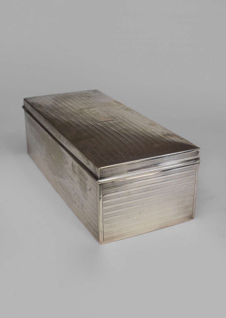 English Mid-Century (1940s) sterling silver rectangular (cigarette) box with fluted etched design and initials: A.M.G.
