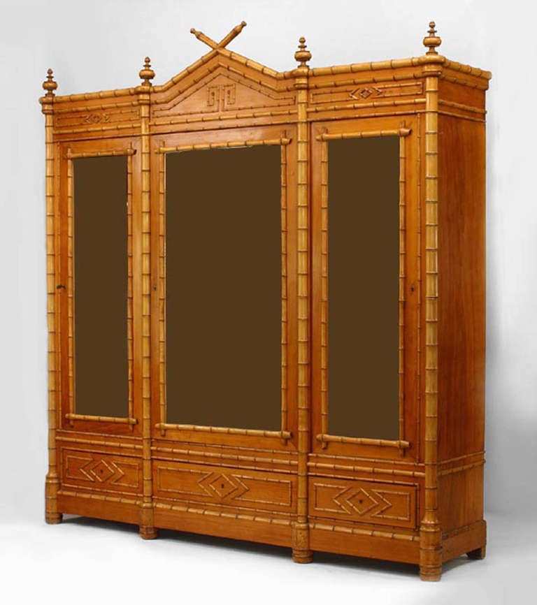 American Victorian-style (19th Century) faux bamboo birds eye maple 3 section display cabinet with glass doors & center pediment
