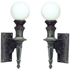 Antique Pair of American Bronze and Glass Outdoor Torch Sconces