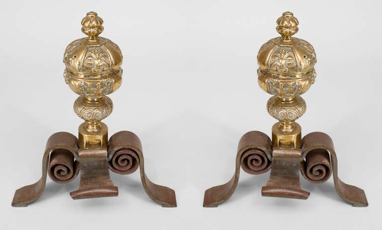 Pair of Italian Neo-classic-style andirons with a large brass ball top over a steel double scroll design base. (PRICED AS Pair)
