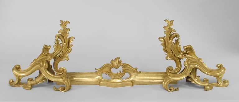 French Louis XV-style (19th Century) gilt bronze chenets & fire fender with scrolling foliate detail (chenets: 16¬º