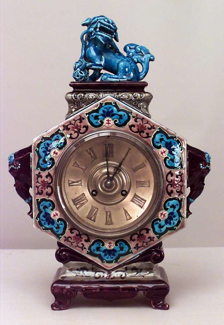 French (Mid-19th Century) Chinoiserie design faience 6-sided mantel clock with foo dog top and elephant heads on sides. (by JULES VIEILLARD, Bordeau France) (Not working)
